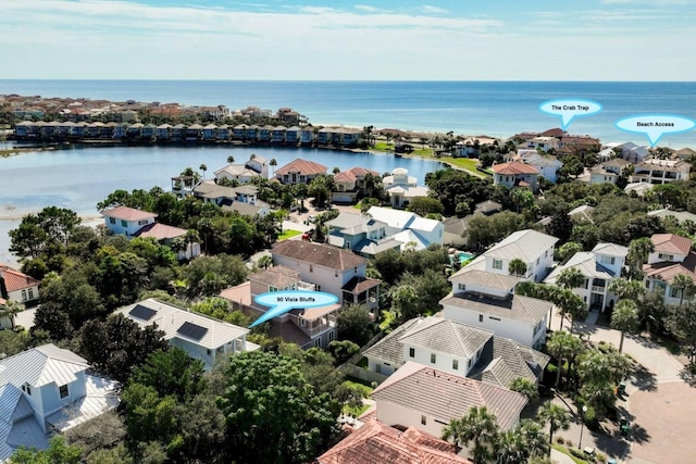 aerial view featuring a water view and a residential view