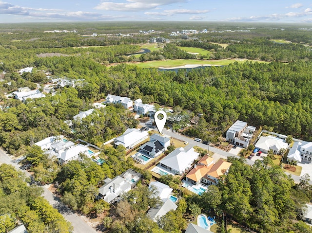 aerial view featuring a residential view and a view of trees