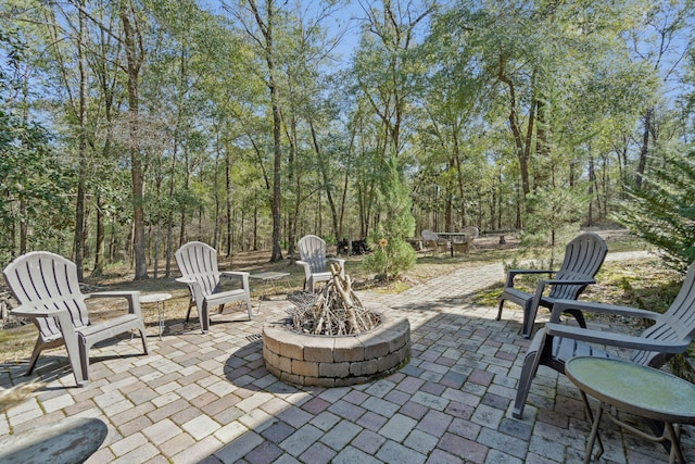 view of patio featuring a fire pit