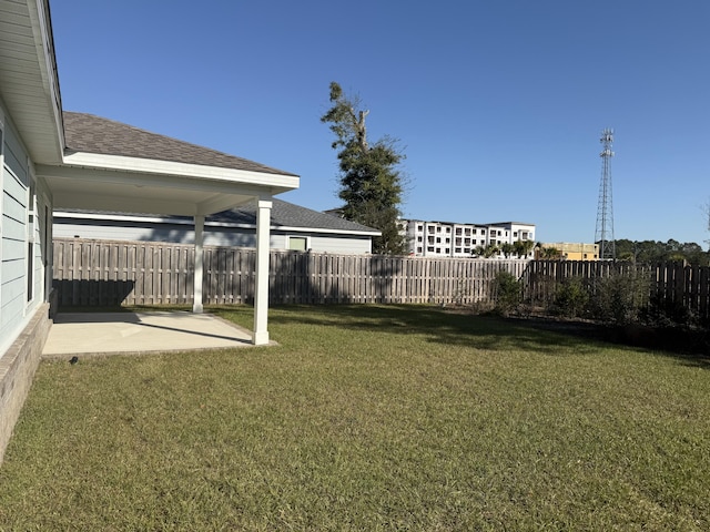 view of yard with a patio and fence