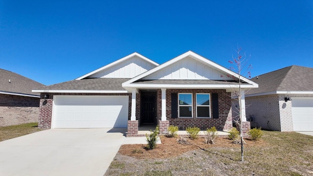 view of front of house with brick siding, driveway, a garage, and board and batten siding