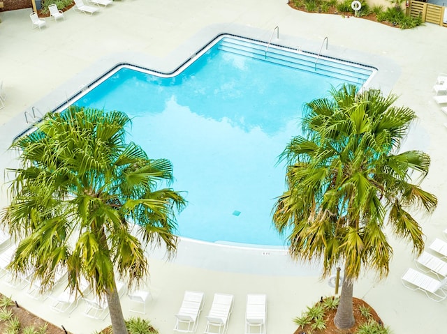 pool with a patio area