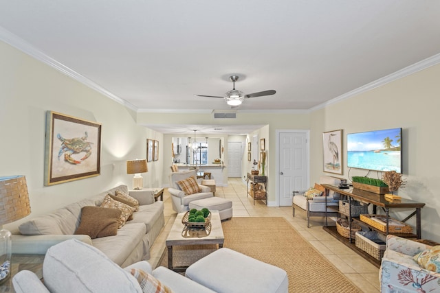 living room featuring ceiling fan, light tile patterned floors, visible vents, and ornamental molding