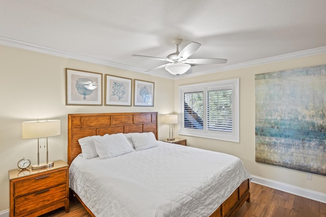 bedroom with a ceiling fan, crown molding, baseboards, and wood finished floors