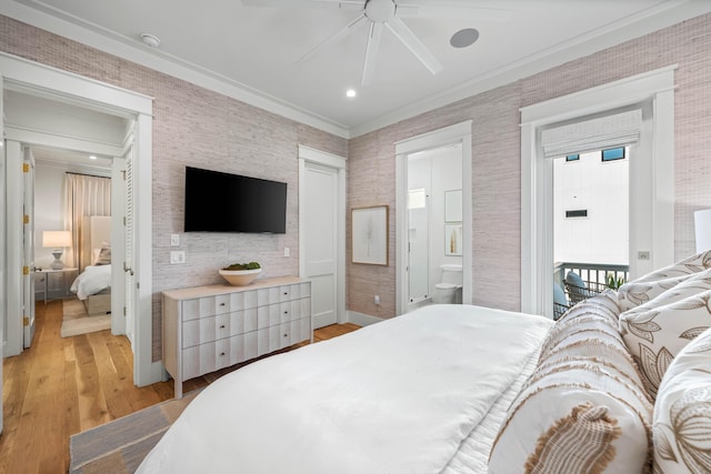 bedroom with access to exterior, light wood-style flooring, ornamental molding, connected bathroom, and baseboards