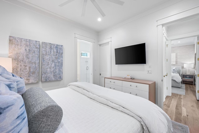 bedroom featuring ornamental molding, recessed lighting, light wood-style flooring, and a ceiling fan