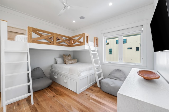 bedroom with recessed lighting, crown molding, light wood finished floors, and ceiling fan