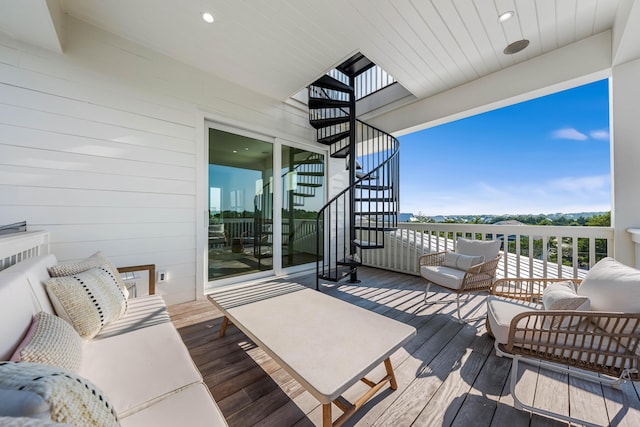 deck featuring stairway and an outdoor hangout area