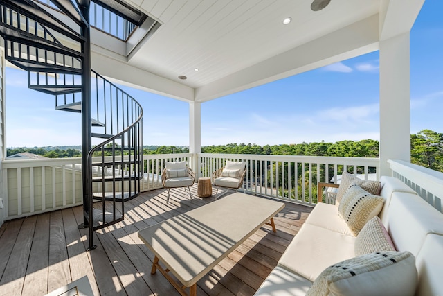 deck with an outdoor hangout area