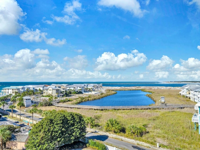 drone / aerial view with a water view