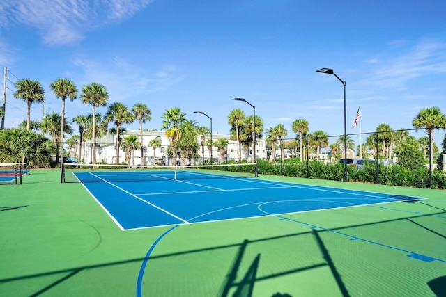 view of sport court with community basketball court and fence