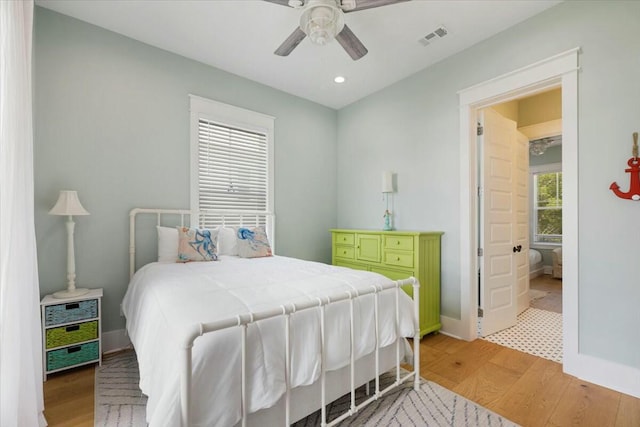 bedroom featuring recessed lighting, a ceiling fan, visible vents, baseboards, and light wood finished floors