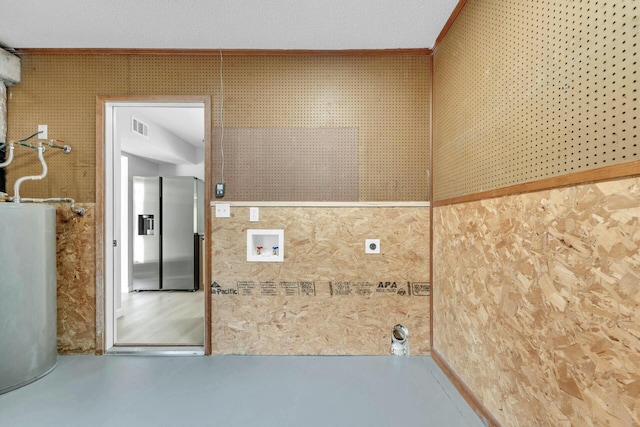 washroom with visible vents, washer hookup, water heater, hookup for an electric dryer, and laundry area