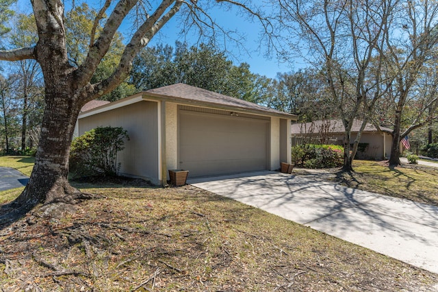 garage with driveway