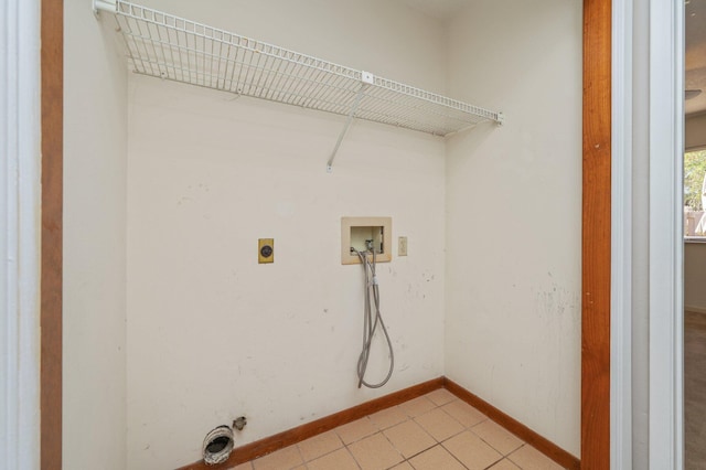 laundry room with washer hookup, laundry area, baseboards, and hookup for an electric dryer