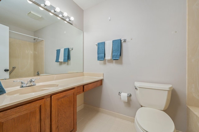 full bath featuring vanity, toilet, a shower, and baseboards