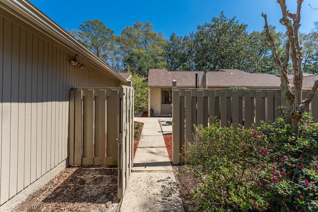 exterior space featuring a gate and fence