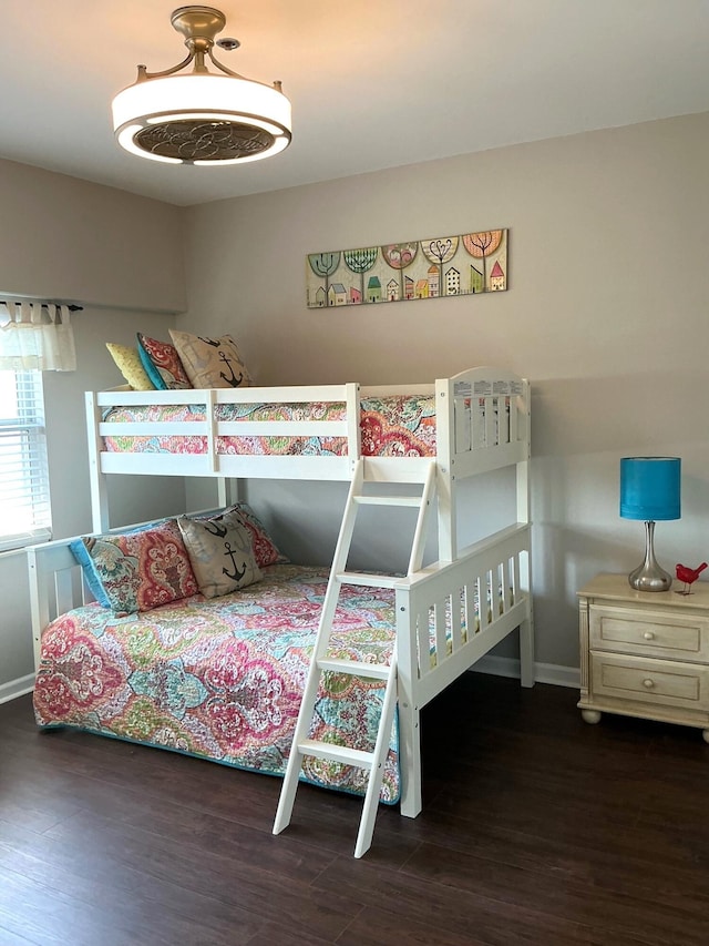 bedroom featuring wood finished floors