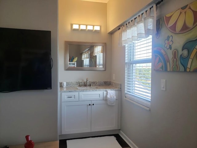 25 Players Clb Unit 25, Miramar Beach, FL 32550 - bathroom with vanity and baseboards