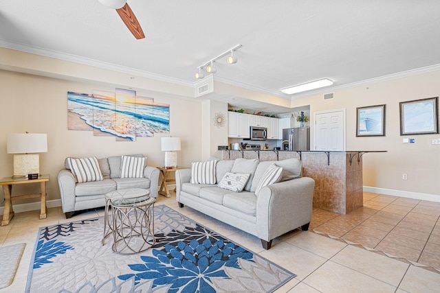 living area featuring ornamental molding, light tile patterned flooring, visible vents, and baseboards