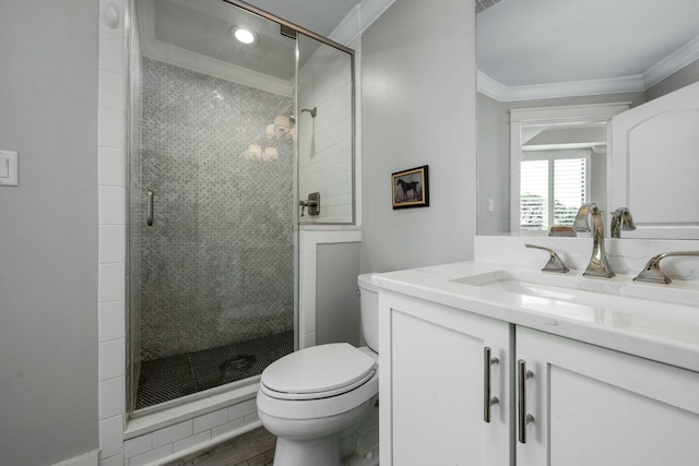 full bathroom featuring toilet, ornamental molding, wood finished floors, a shower stall, and vanity