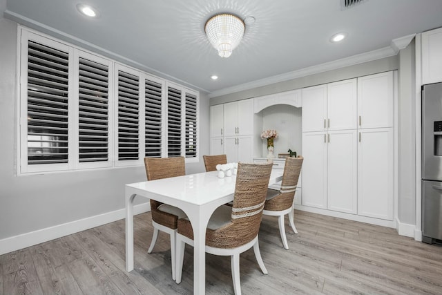 dining room featuring recessed lighting, baseboards, light wood-style floors, and ornamental molding