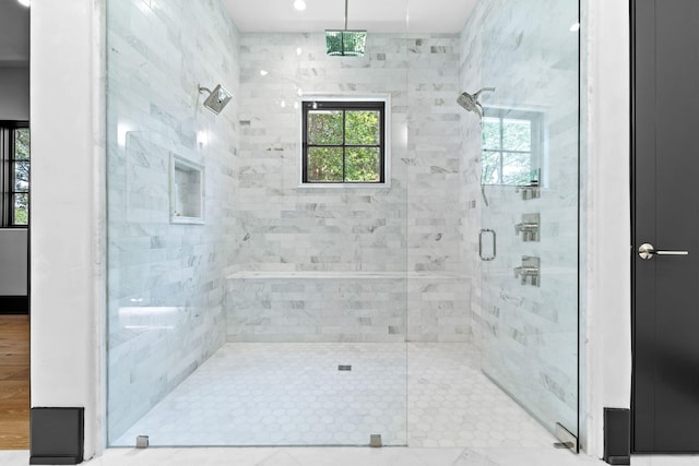 full bath with a shower stall