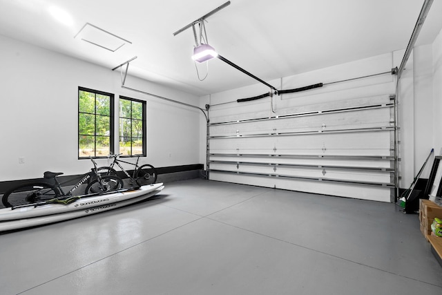 garage featuring a garage door opener