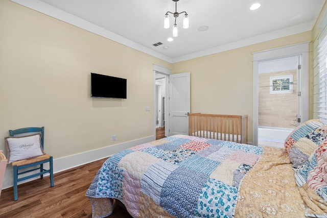 bedroom with recessed lighting, wood finished floors, visible vents, baseboards, and crown molding