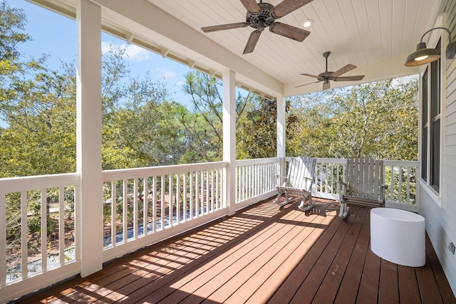 wooden deck with ceiling fan