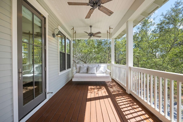 wooden deck with ceiling fan