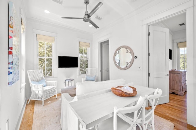 dining area with recessed lighting, visible vents, light wood-style floors, and ornamental molding