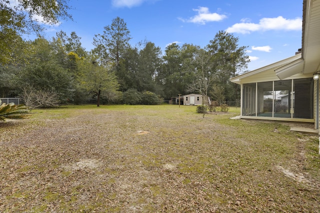 view of yard featuring a sunroom