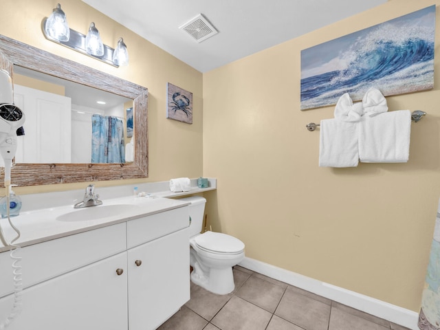 full bath featuring visible vents, toilet, vanity, tile patterned flooring, and baseboards