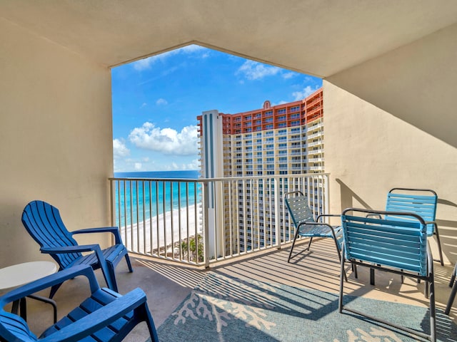 balcony featuring a water view