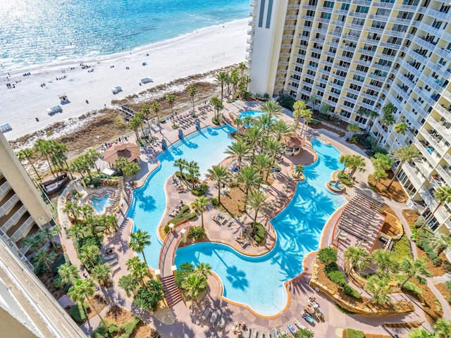 birds eye view of property with a beach view