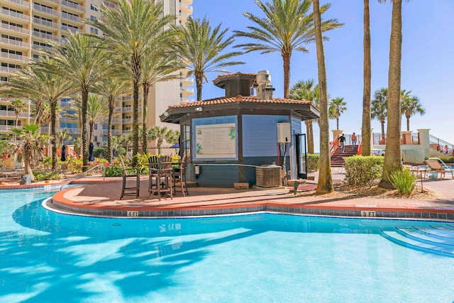 pool with a patio