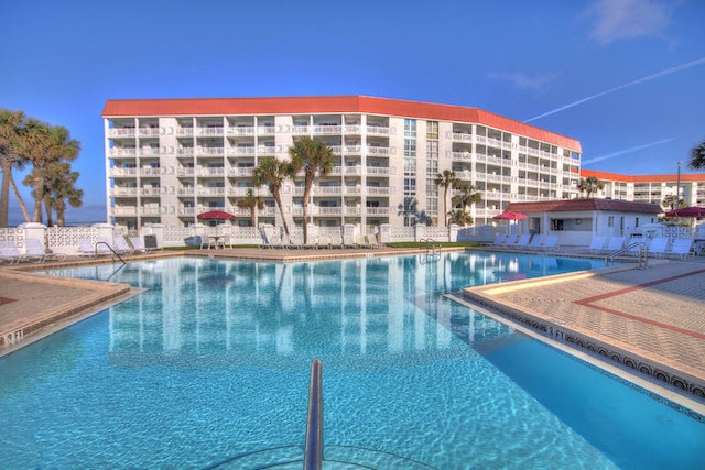 pool with a patio area