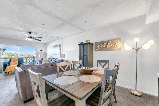 909 Santa Rosa Blvd Unit 537, Fort Walton Beach, FL 32548 - dining room featuring baseboards, a ceiling fan, light colored carpet, and a textured ceiling