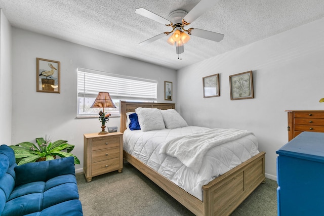 909 Santa Rosa Blvd Unit 537, Fort Walton Beach, FL 32548 - carpeted bedroom featuring a ceiling fan, baseboards, and a textured ceiling