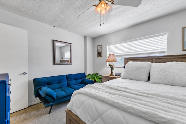909 Santa Rosa Blvd Unit 537, Fort Walton Beach, FL 32548 - carpeted bedroom with a textured ceiling and ceiling fan