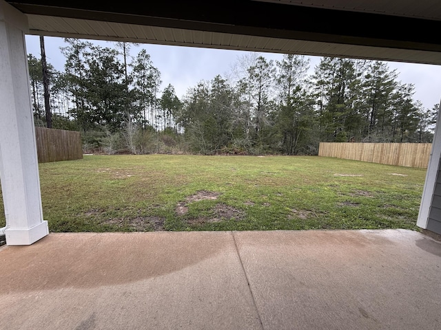 view of yard with a patio area and fence