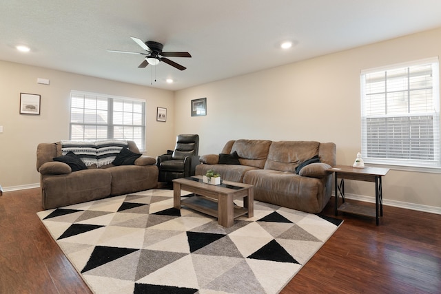 living area featuring recessed lighting, a ceiling fan, baseboards, and wood finished floors