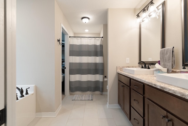 full bath featuring double vanity, tile patterned flooring, a washtub, and a sink