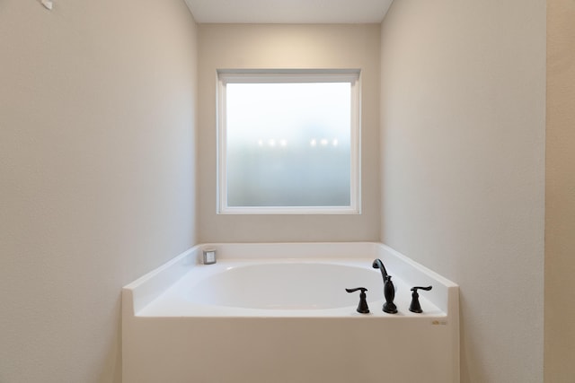 bathroom with a bath