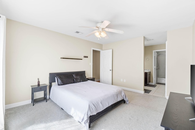 bedroom with baseboards, visible vents, ceiling fan, and light colored carpet