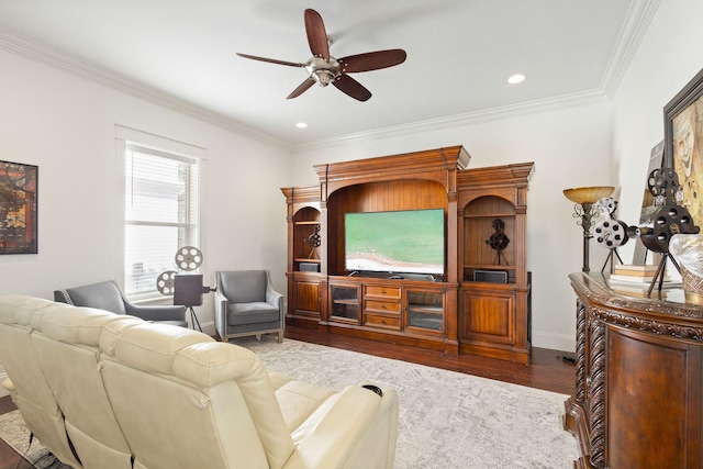 living area with ceiling fan, dark wood-style flooring, baseboards, and crown molding