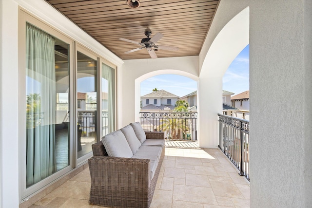 balcony with a ceiling fan and outdoor lounge area