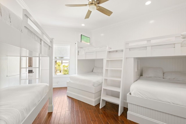 bedroom with crown molding, a ceiling fan, hardwood / wood-style floors, and recessed lighting