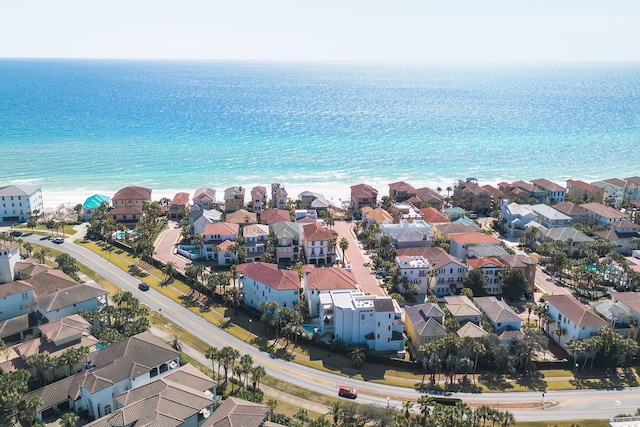 bird's eye view with a water view and a residential view